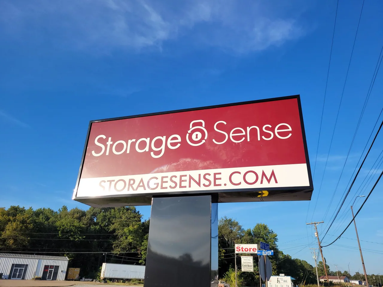 Elevated illuminated sign identifying a self-storage business